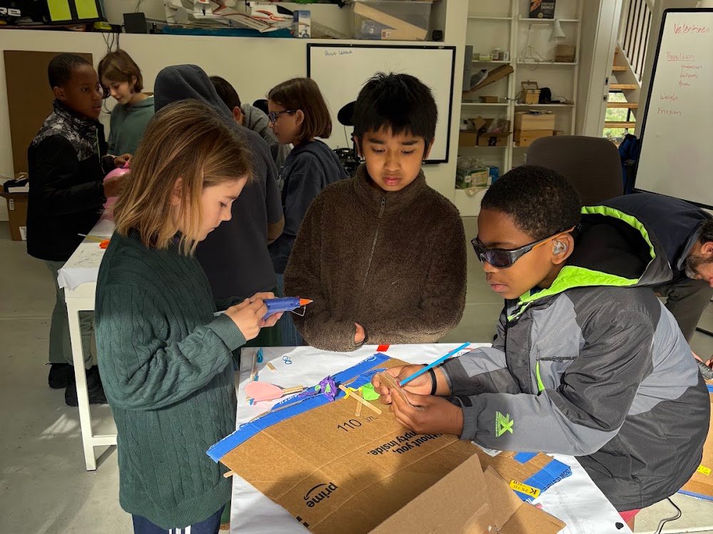 Kids building Valentine-sending contraptions